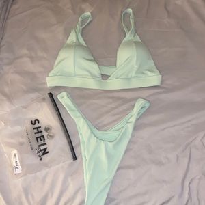 Full Shein swimsuit, brand new and hasn’t been worn. Color is a mint green.
